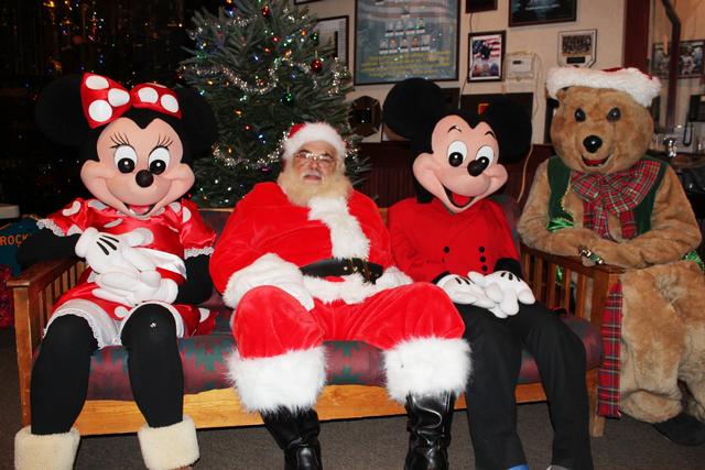 Children's Christmas Party at 8-100. 12-9-2012. Santa pays a visit . Photo by Vincent P. Tuzzolino